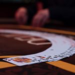 Poker playing cards on the table at a poker room in Ontario Oregon